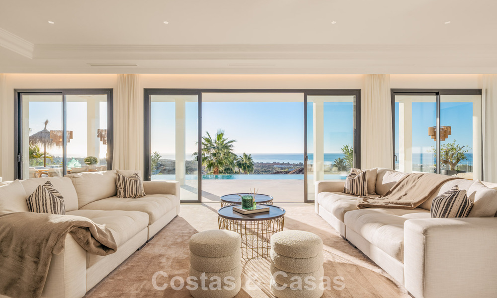 Exclusieve designvilla met panoramisch zeezicht te koop in het een vijfsterren golfresort in Marbella - Benahavis 74771