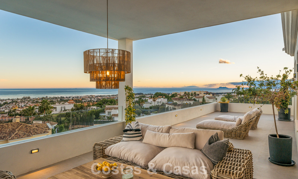 Exclusieve designvilla met panoramisch zeezicht te koop in het een vijfsterren golfresort in Marbella - Benahavis 74805