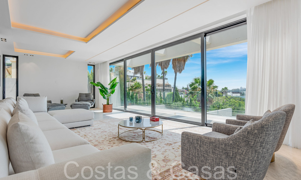 Nieuwe, modernistische designervilla te koop met prachtig zeezicht in vijfsterren golfresort te Marbella - Benahavis 68480