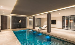 Ruime, modernistische luxevilla te koop met uitzicht op de golfbaan in Benahavis - Marbella 68127 