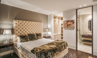 Ruime, modernistische luxevilla te koop met uitzicht op de golfbaan in Benahavis - Marbella 68128 