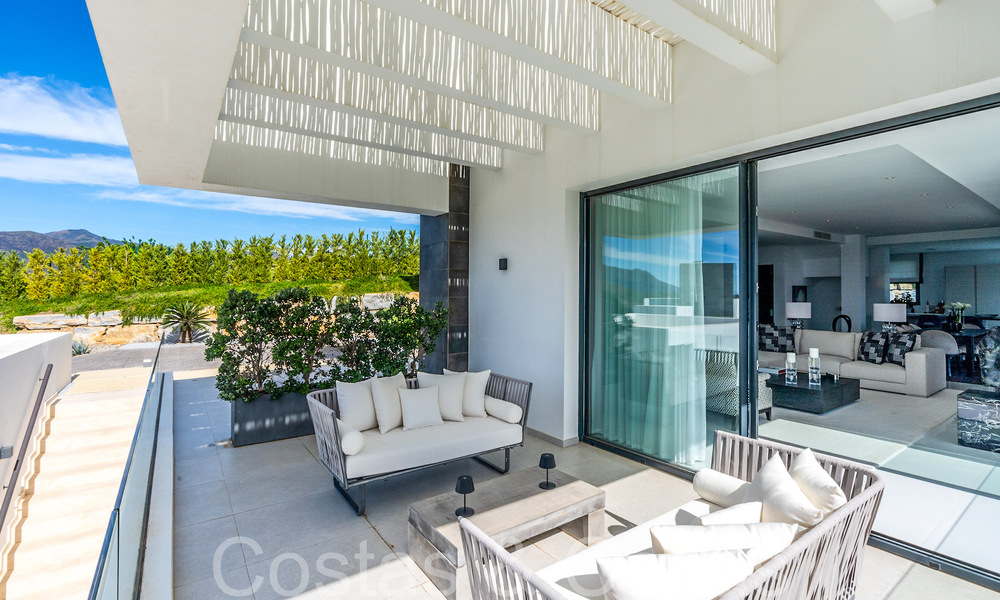 Instapklare luxevilla met panoramische vergezichten te koop in een gated community van Benahavis - Marbella 70051