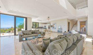 Moderne luxevilla met fantastisch uitzicht over de golfbaan naar zee, te koop in Marbella - Benahavis 70476 