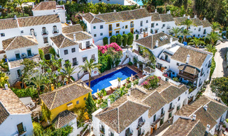 Prestigieus herenhuis te koop in een exclusieve ‘pueblo-stijl’ urbanisatie op Marbella’s Golden Mile 73201 