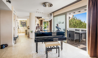 Modern eerstelijnsgolf penthouse met prachtig golf- en zeezicht te koop in een 5* golfresort in Marbella - Benahavis 73962 