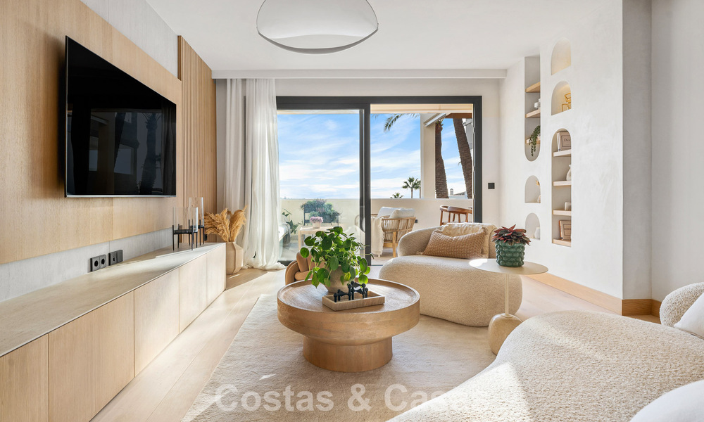 Modern gerenoveerd luxe appartement te koop met panoramisch zeezicht in Nueva Andalucia’ golfvallei, Marbella 773793